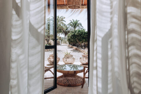 Main house bedroom view to entrance gate