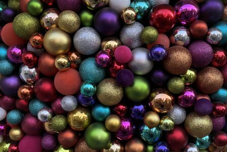 Elegant Christmas baubles in festive colors. Symbol of stylish holidays with concierge service